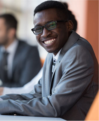 Young smiling man in suit