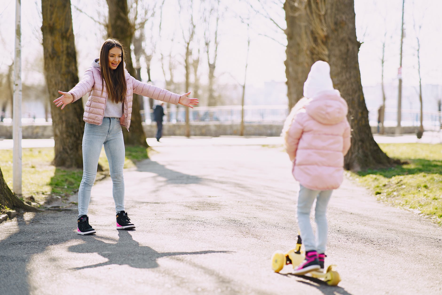 Mother and daughter are spending free time in park